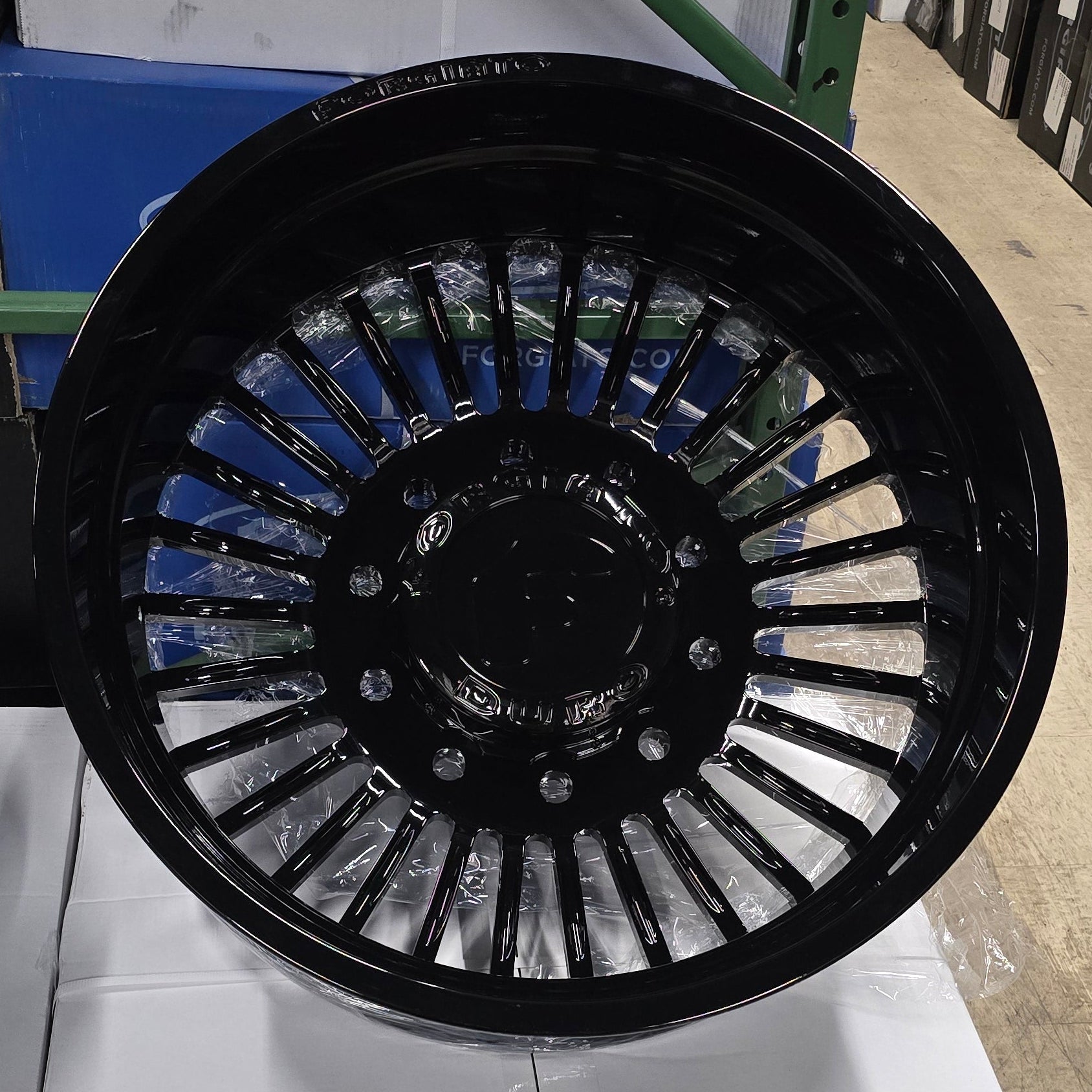 A single green leaf against a white background.