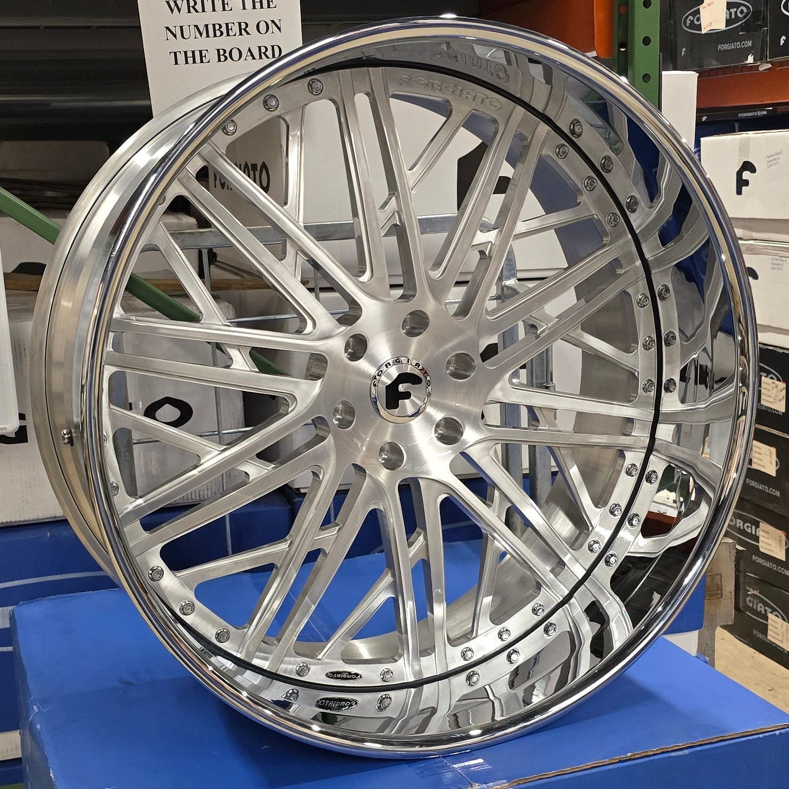 A single green leaf against a white background.
