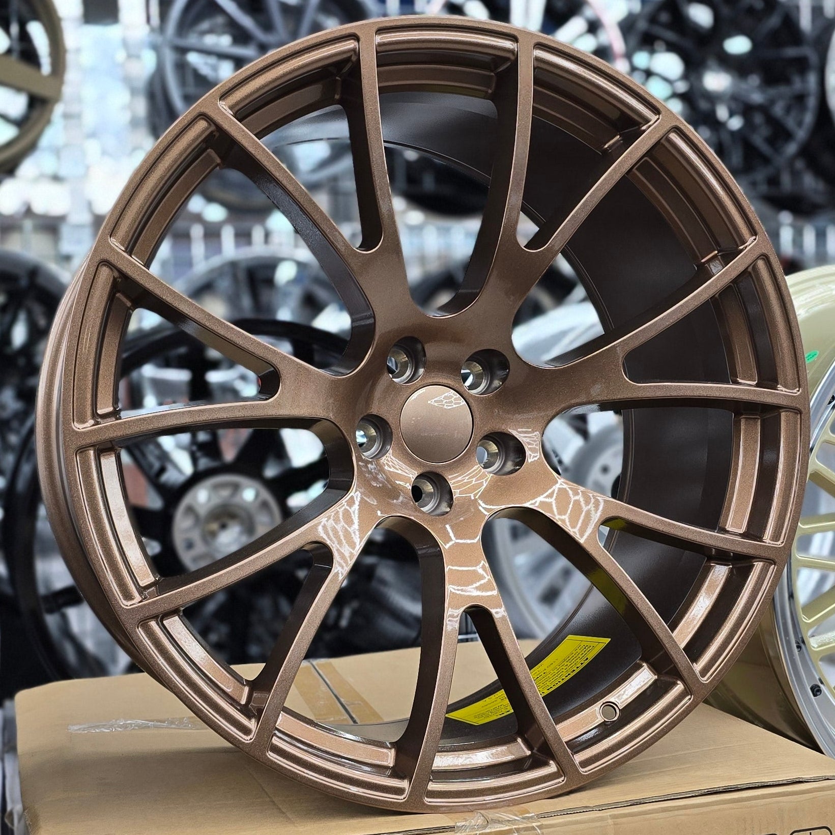 A single green leaf against a white background.
