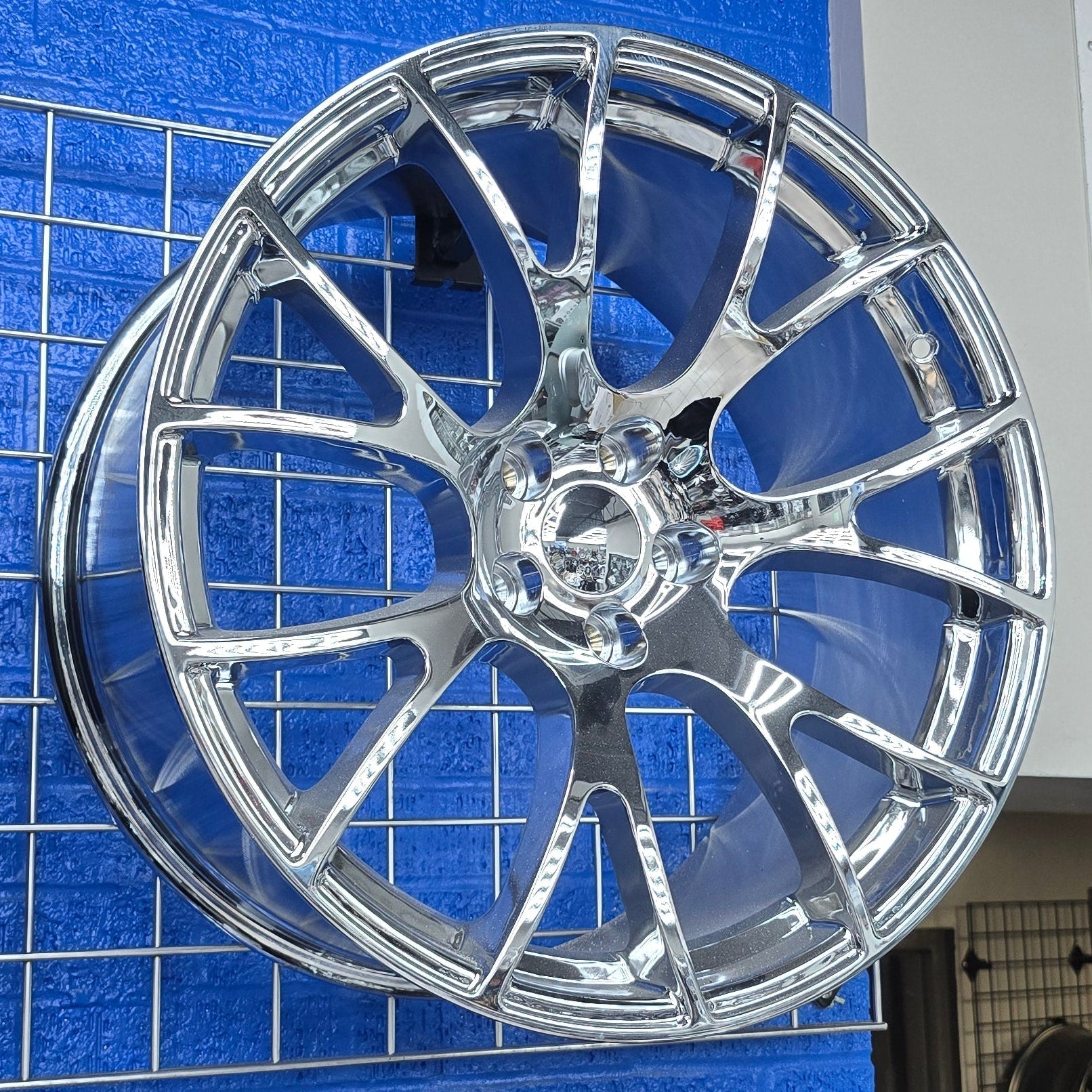 A single green leaf against a white background.