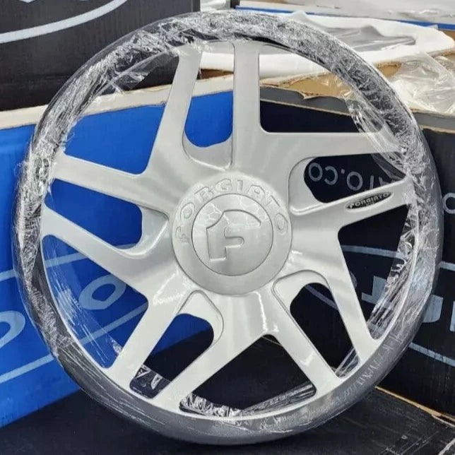 A single green leaf against a white background.