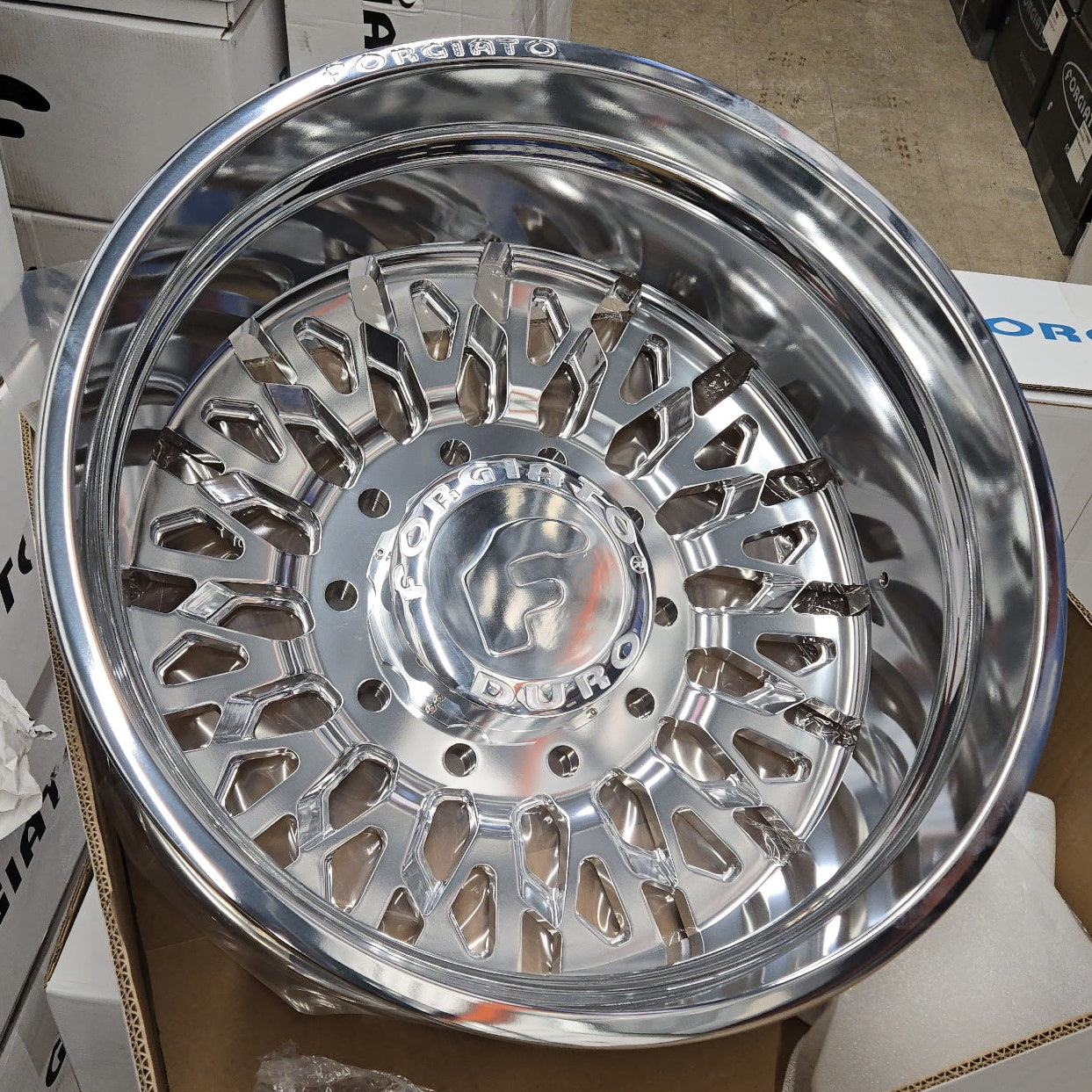 A single green leaf against a white background.