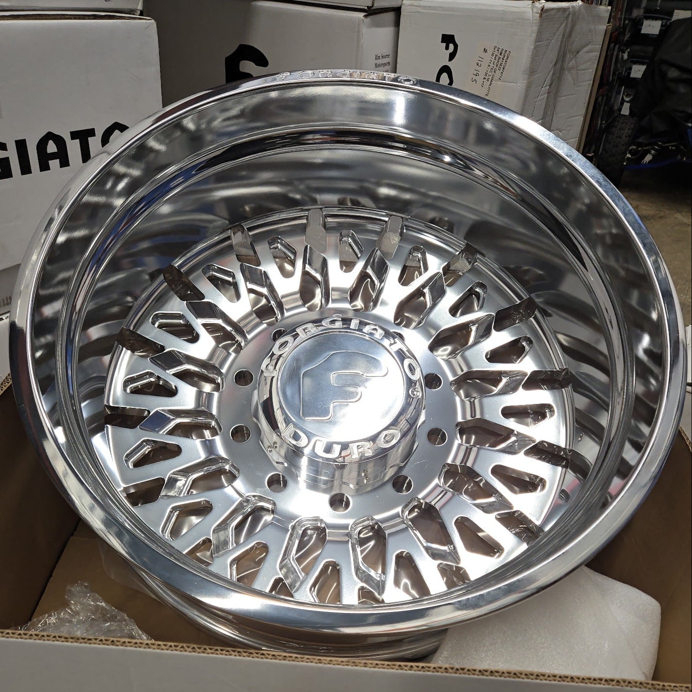 A single green leaf against a white background.