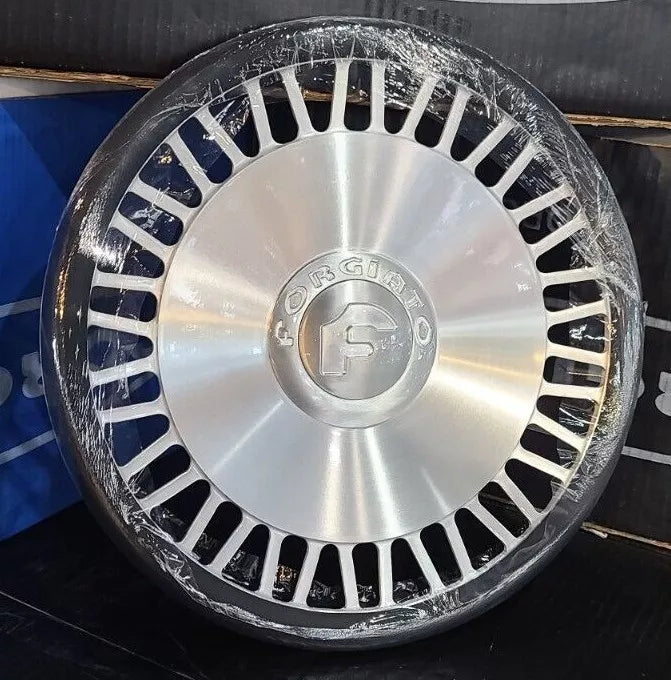 A single green leaf against a white background.