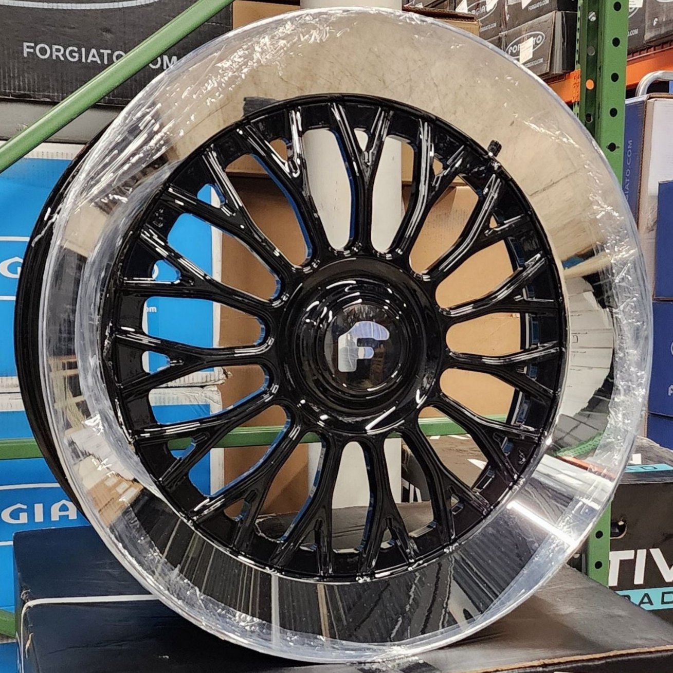 A single green leaf against a white background.