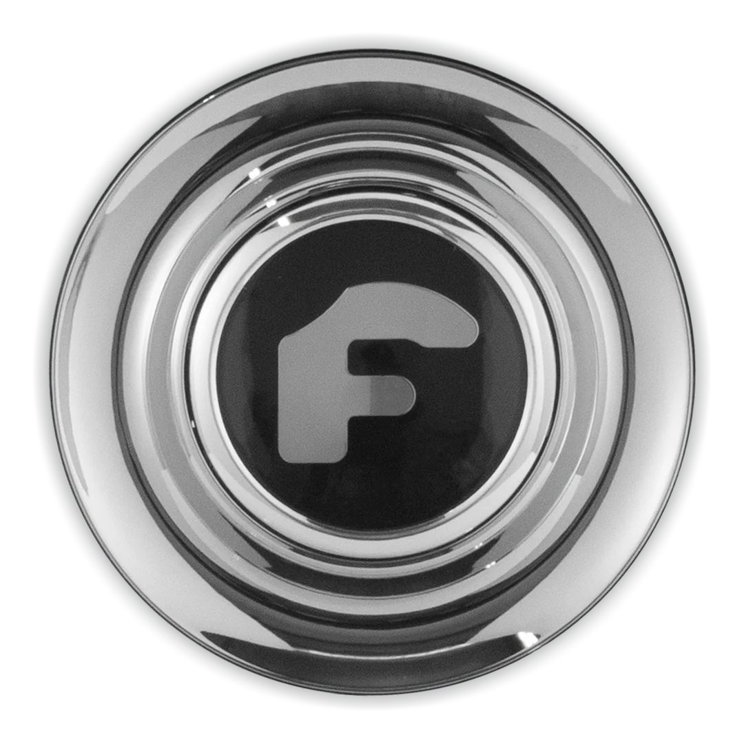 A single green leaf against a white background.