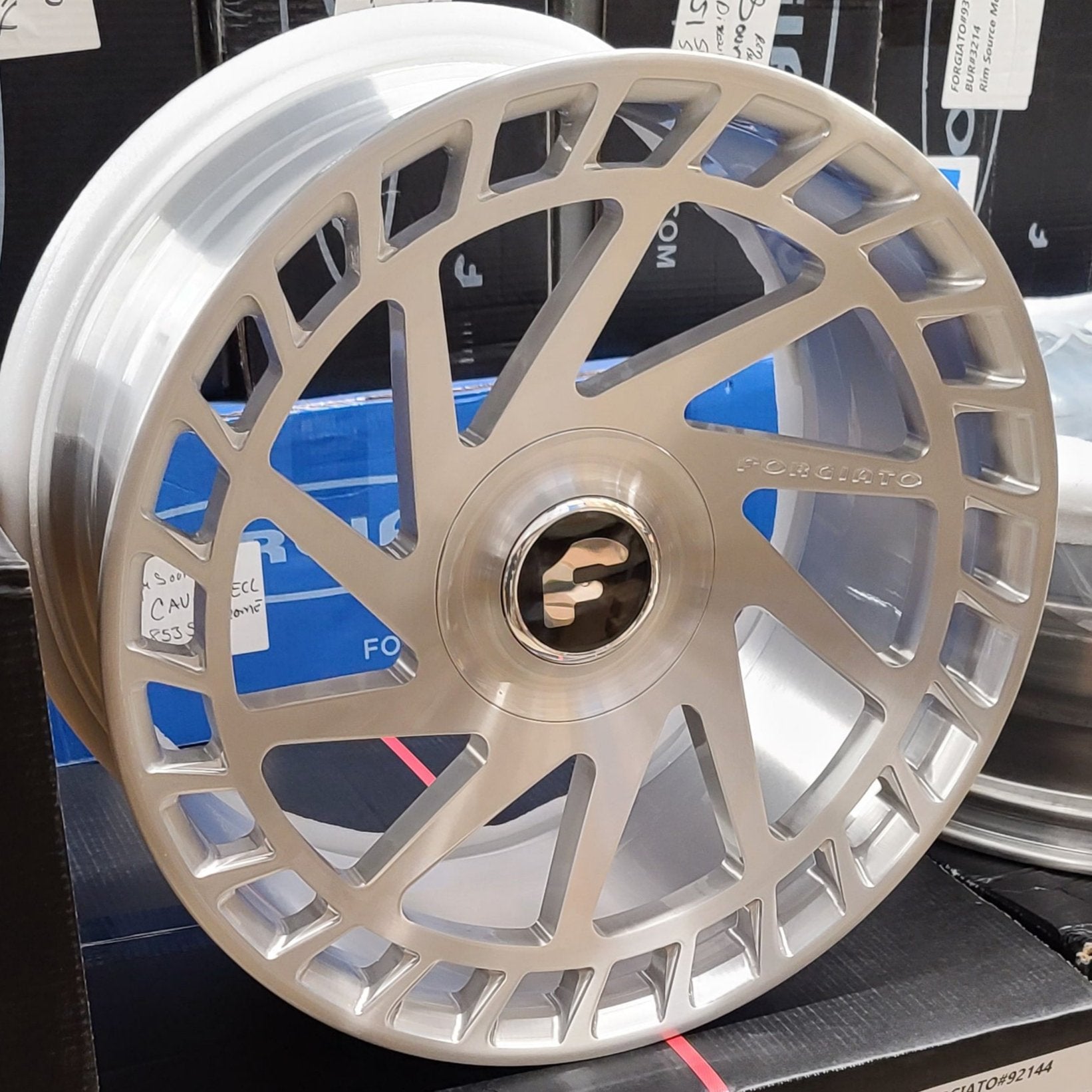 A single green leaf against a white background.
