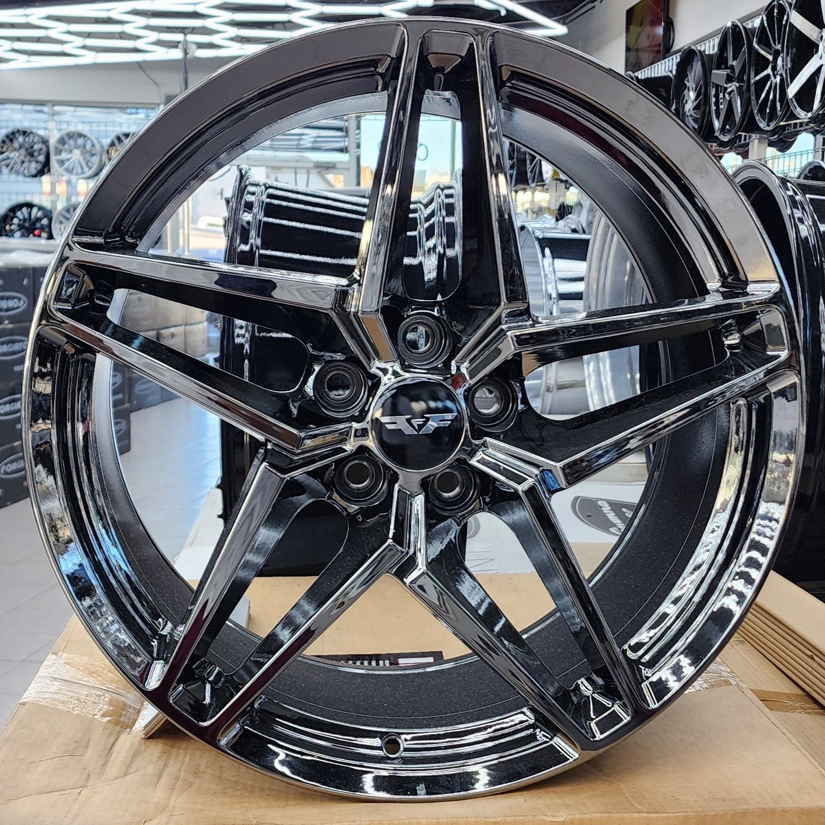 A single green leaf against a white background.