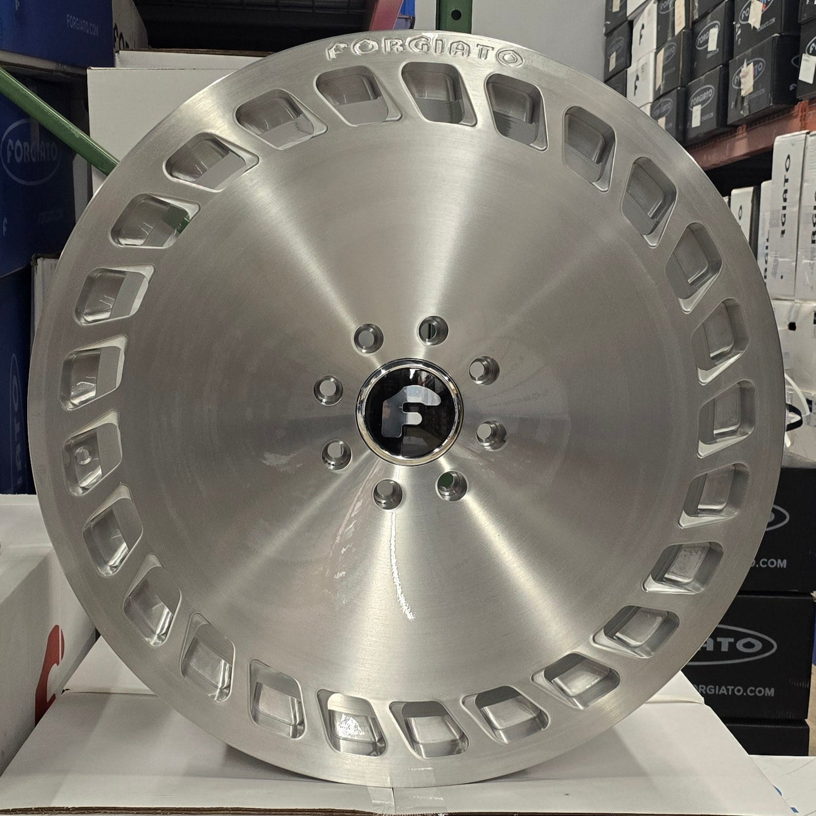 A single green leaf against a white background.