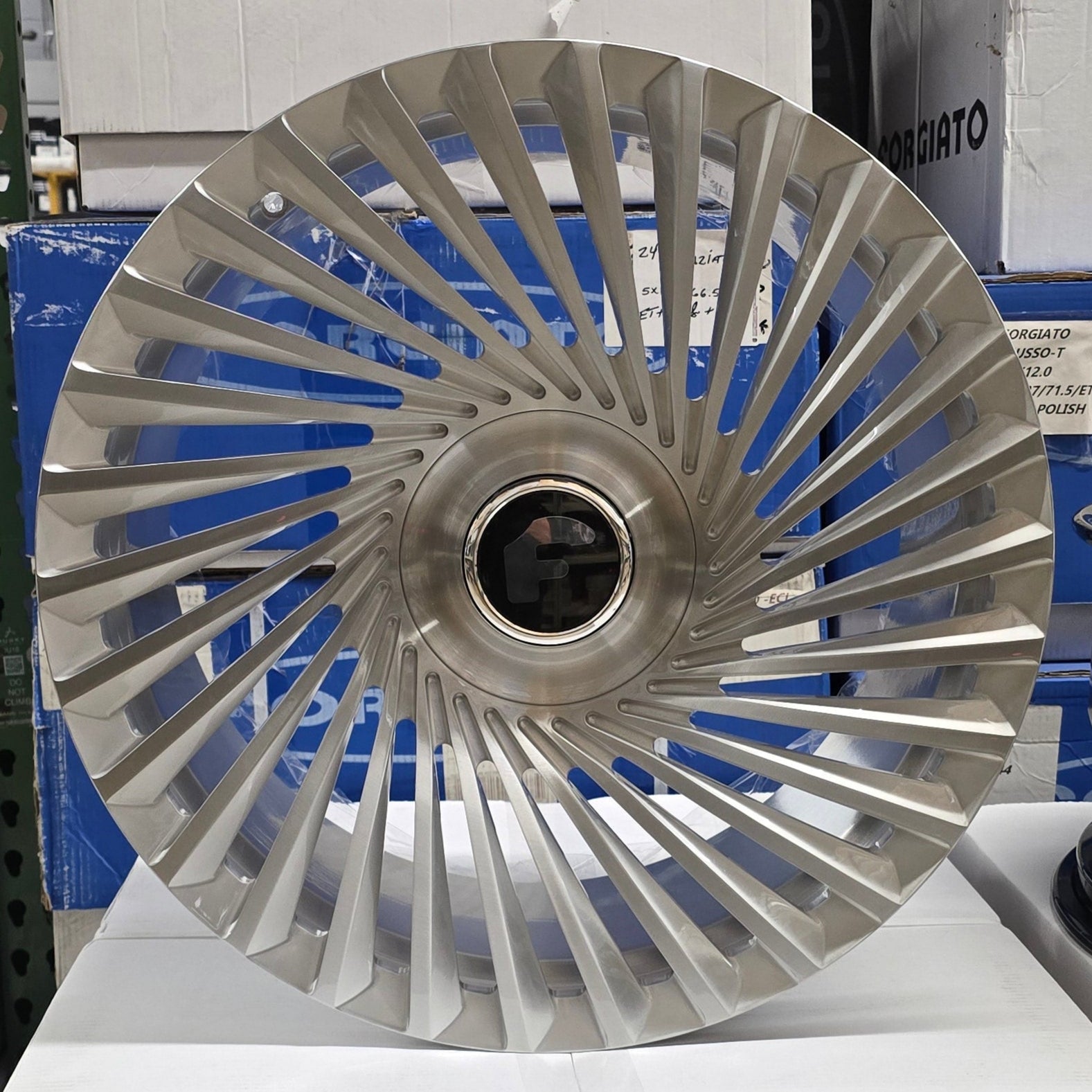 A single green leaf against a white background.