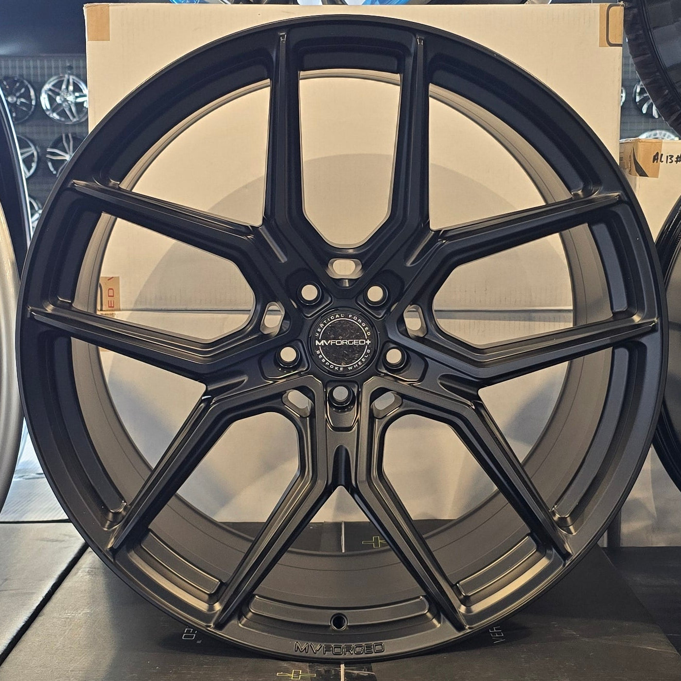 A single green leaf against a white background.