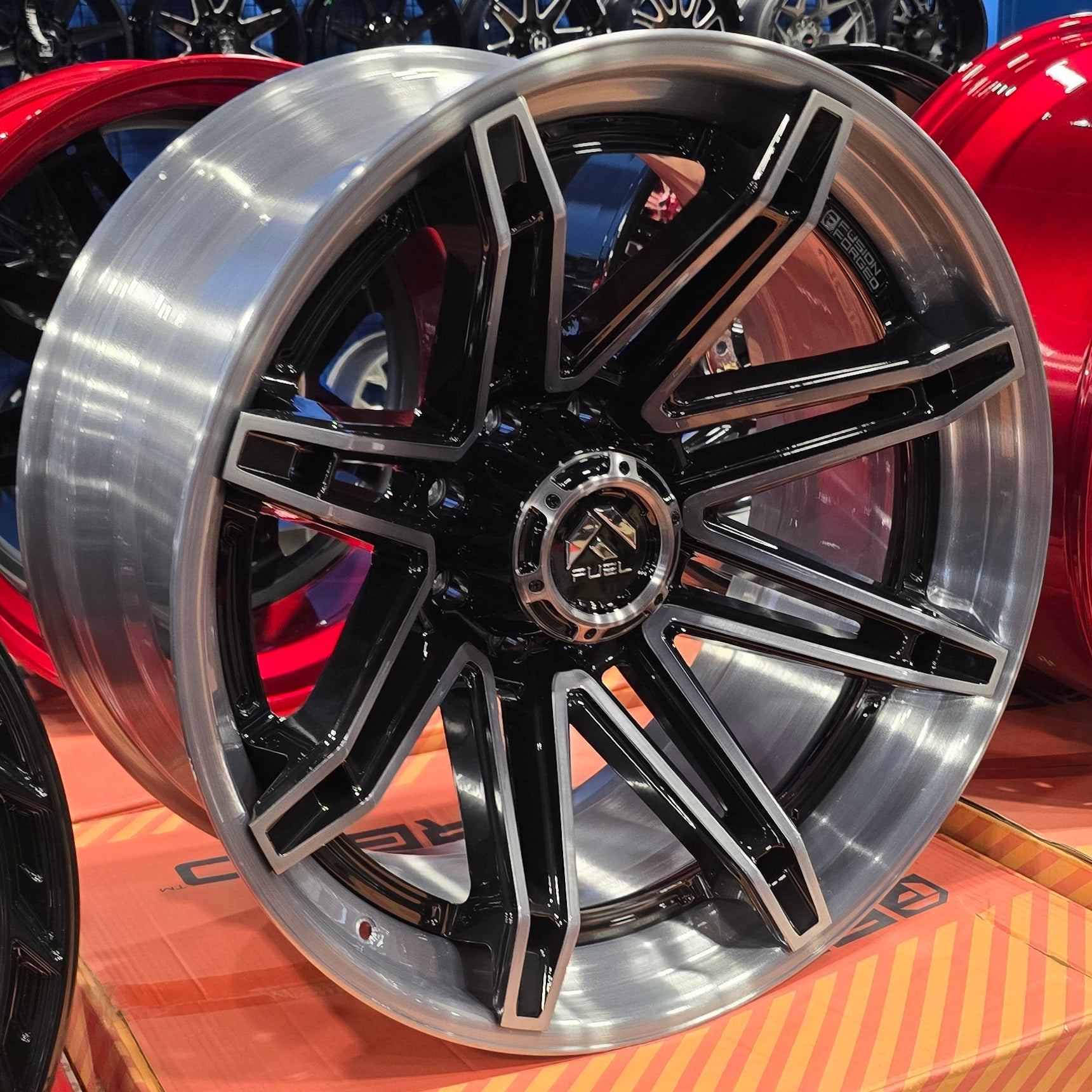 A single green leaf against a white background.