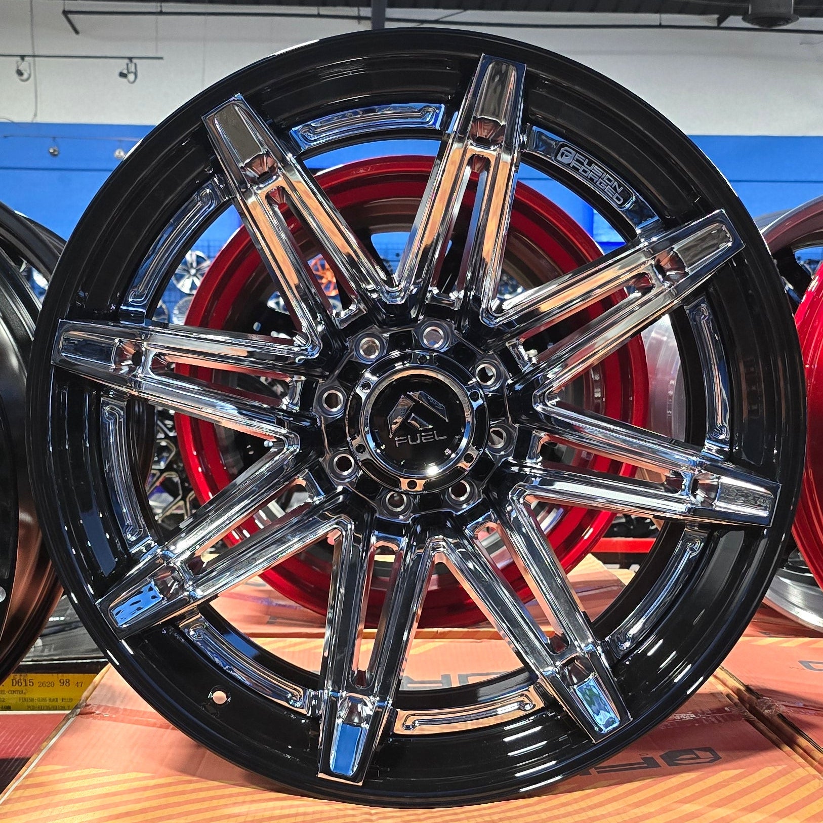 A single green leaf against a white background.