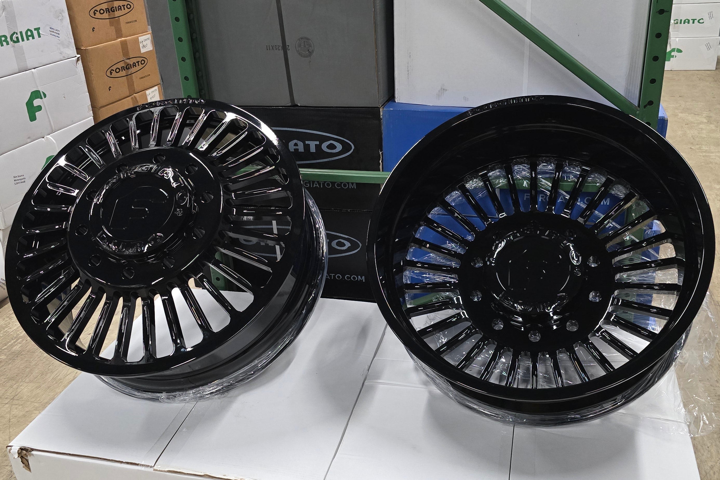 A single green leaf against a white background.