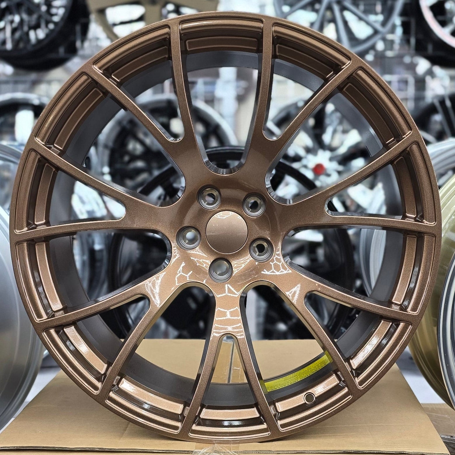 A single green leaf against a white background.