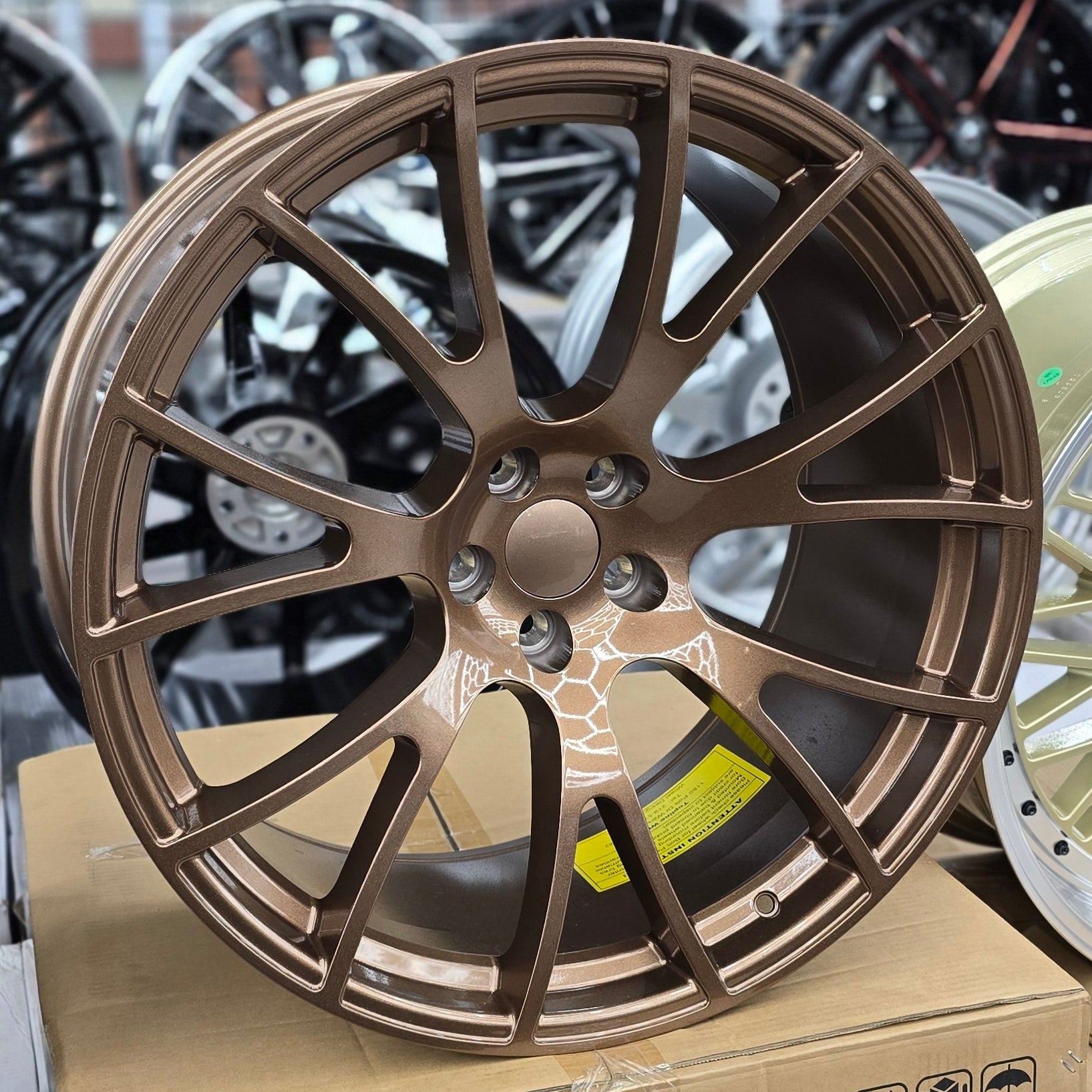 A single green leaf against a white background.