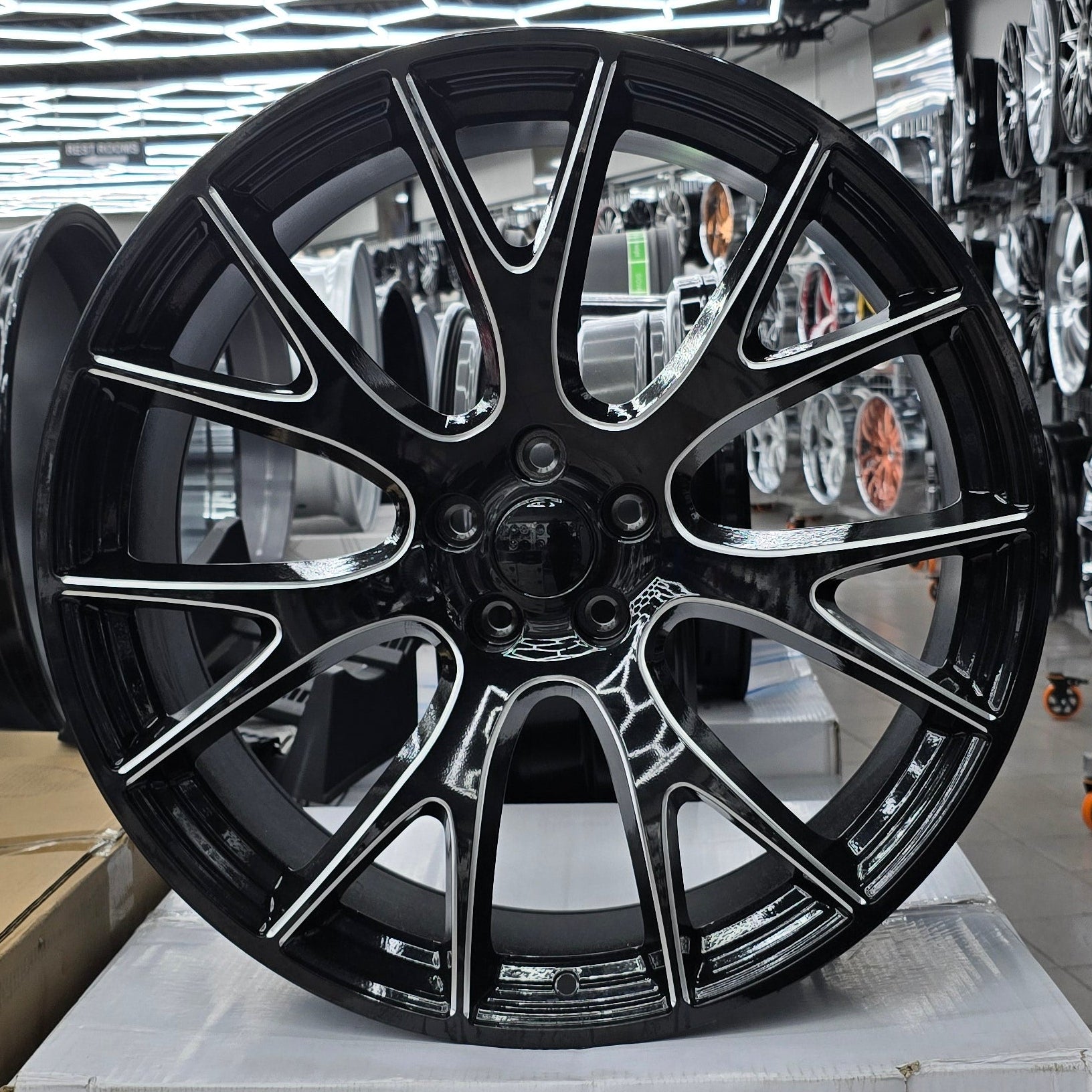 A single green leaf against a white background.