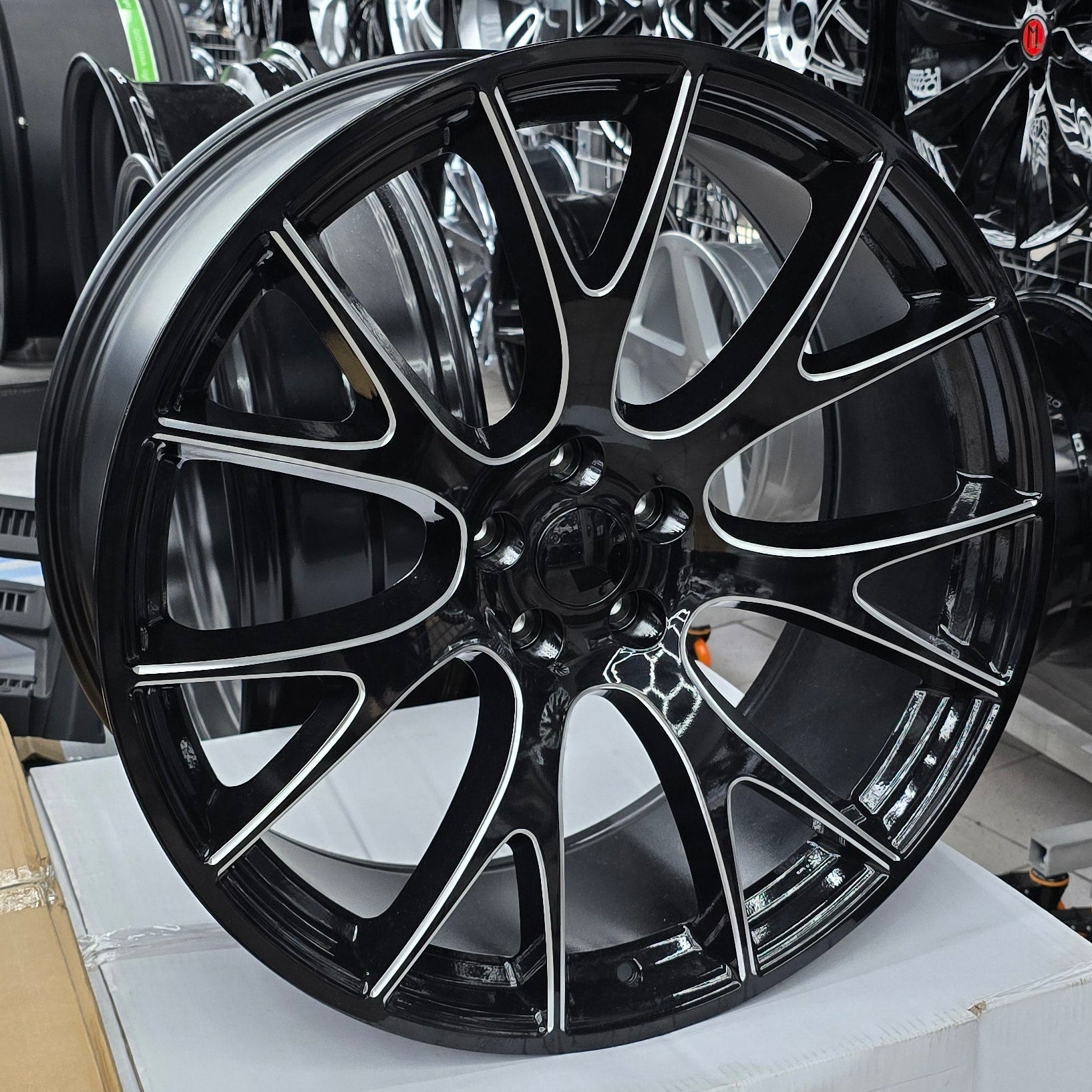 A single green leaf against a white background.