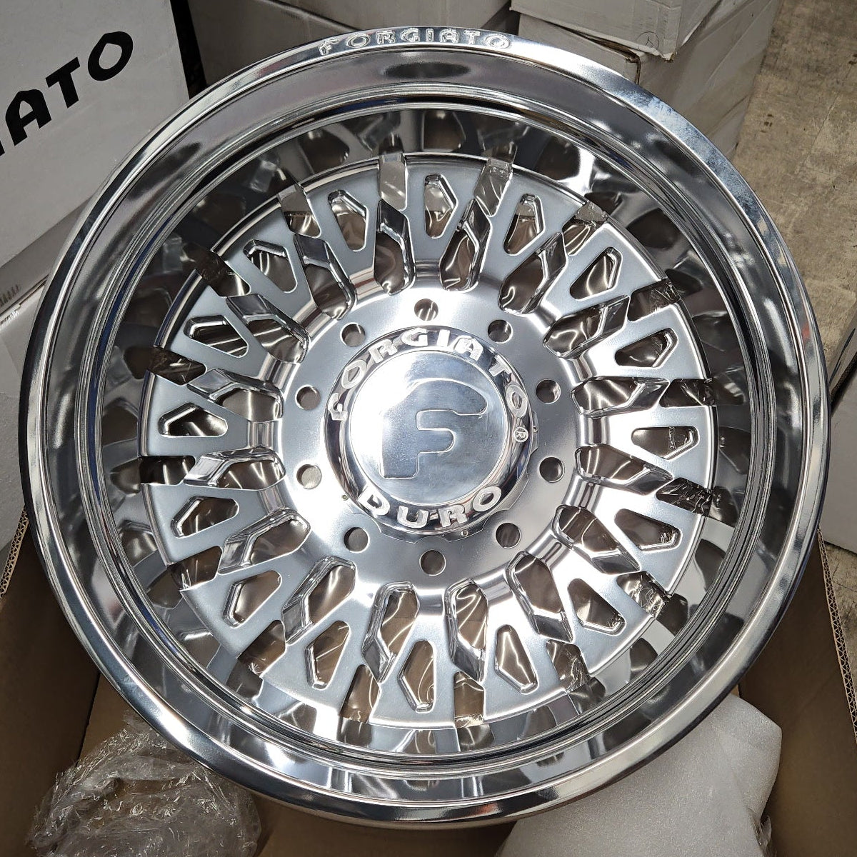 A single green leaf against a white background.